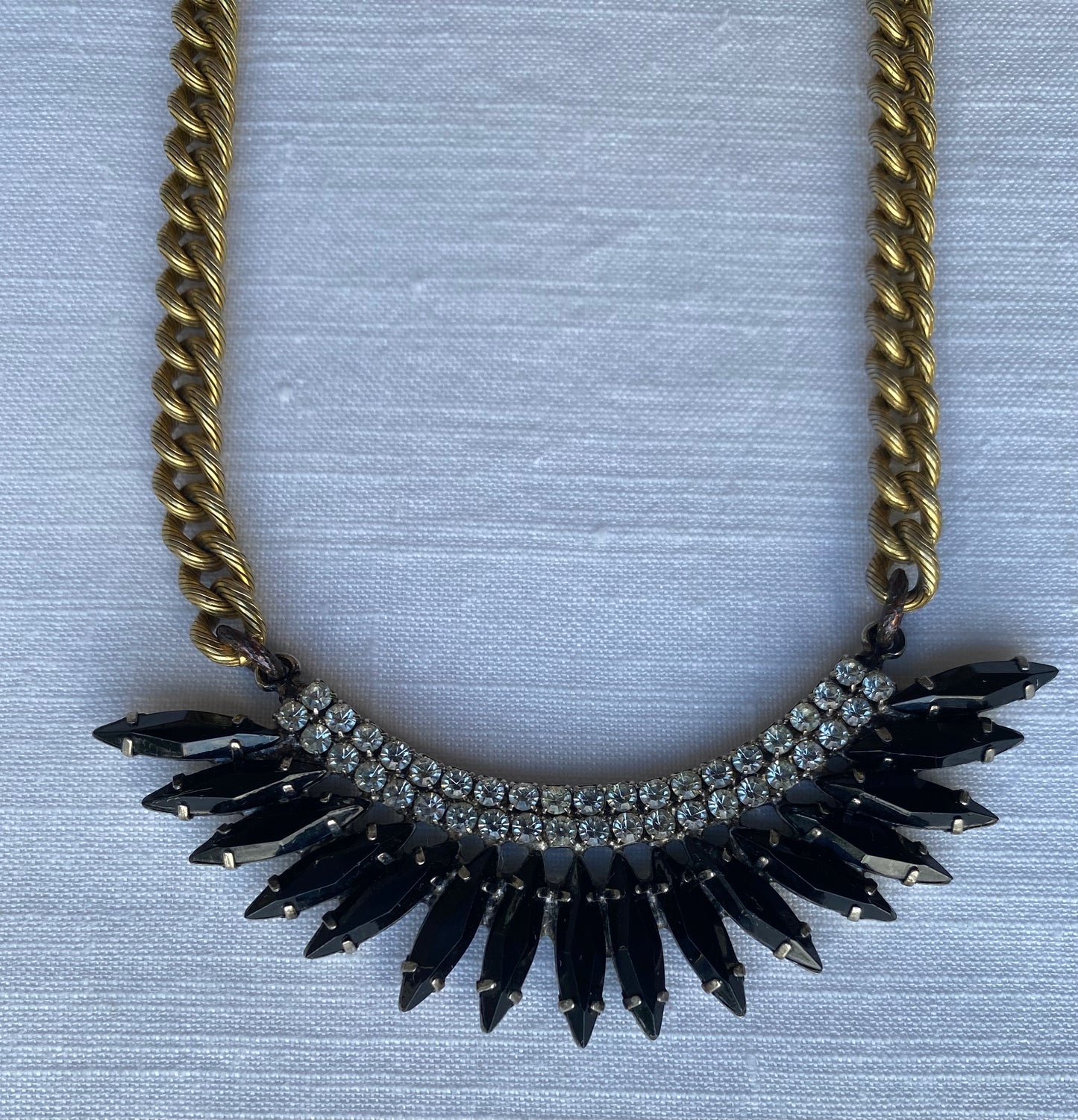 Brass Elizabeth Cole Necklace styled with Hardy Brothers sterling fob chain