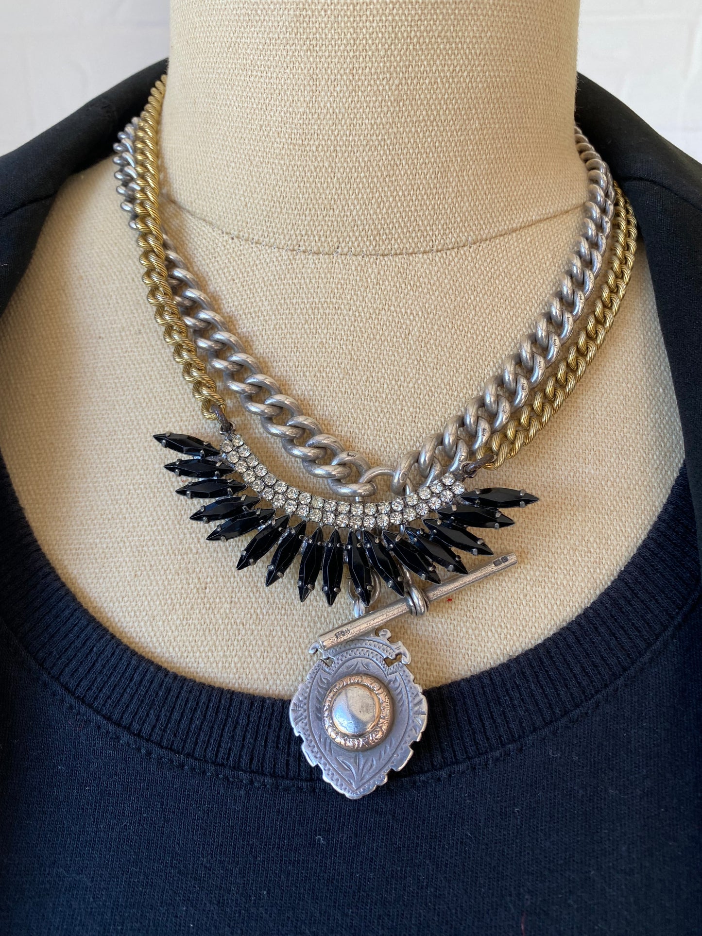 Brass Elizabeth Cole Necklace styled with Hardy Brothers sterling fob chain